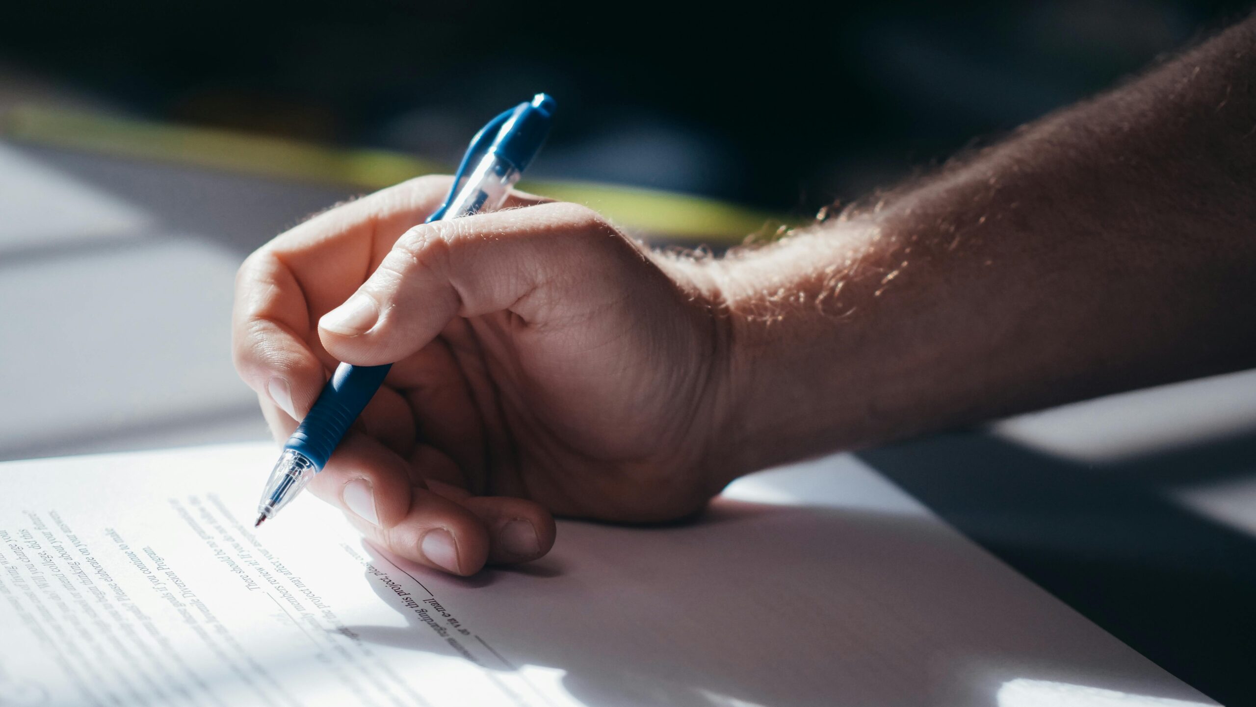Person reviewing compliance documents