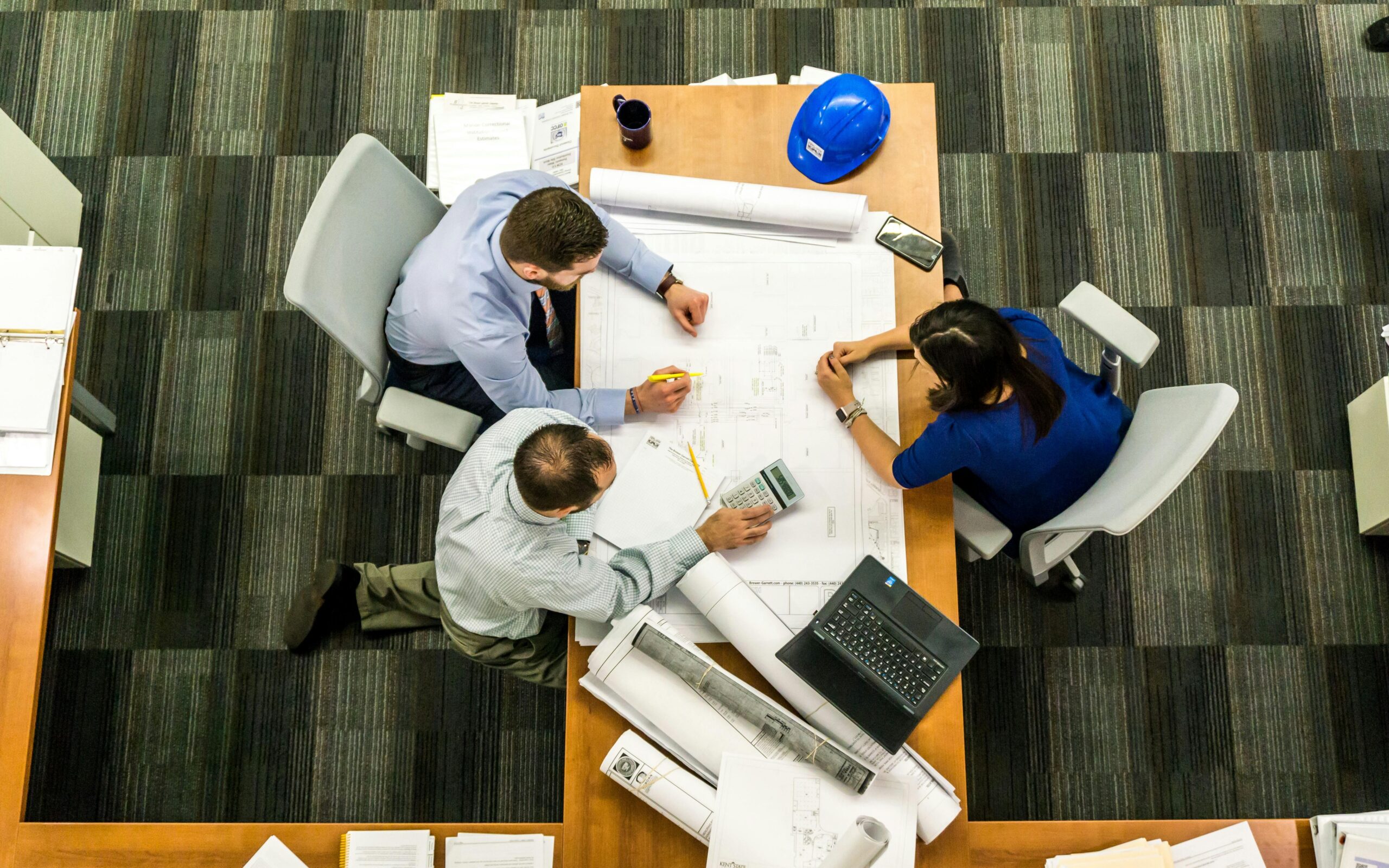Team in discussion around a table